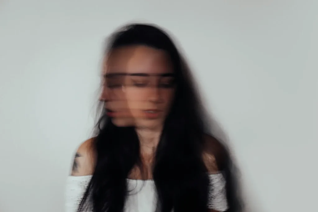 Woman whose face is blurry representing anxiety